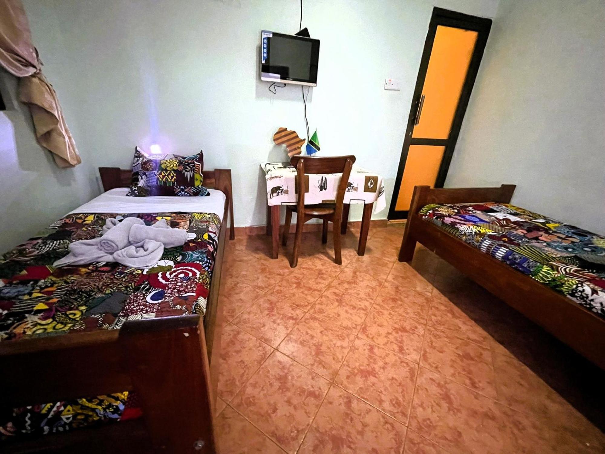 Home Feeling Neneu Lodge Moshi Buitenkant foto