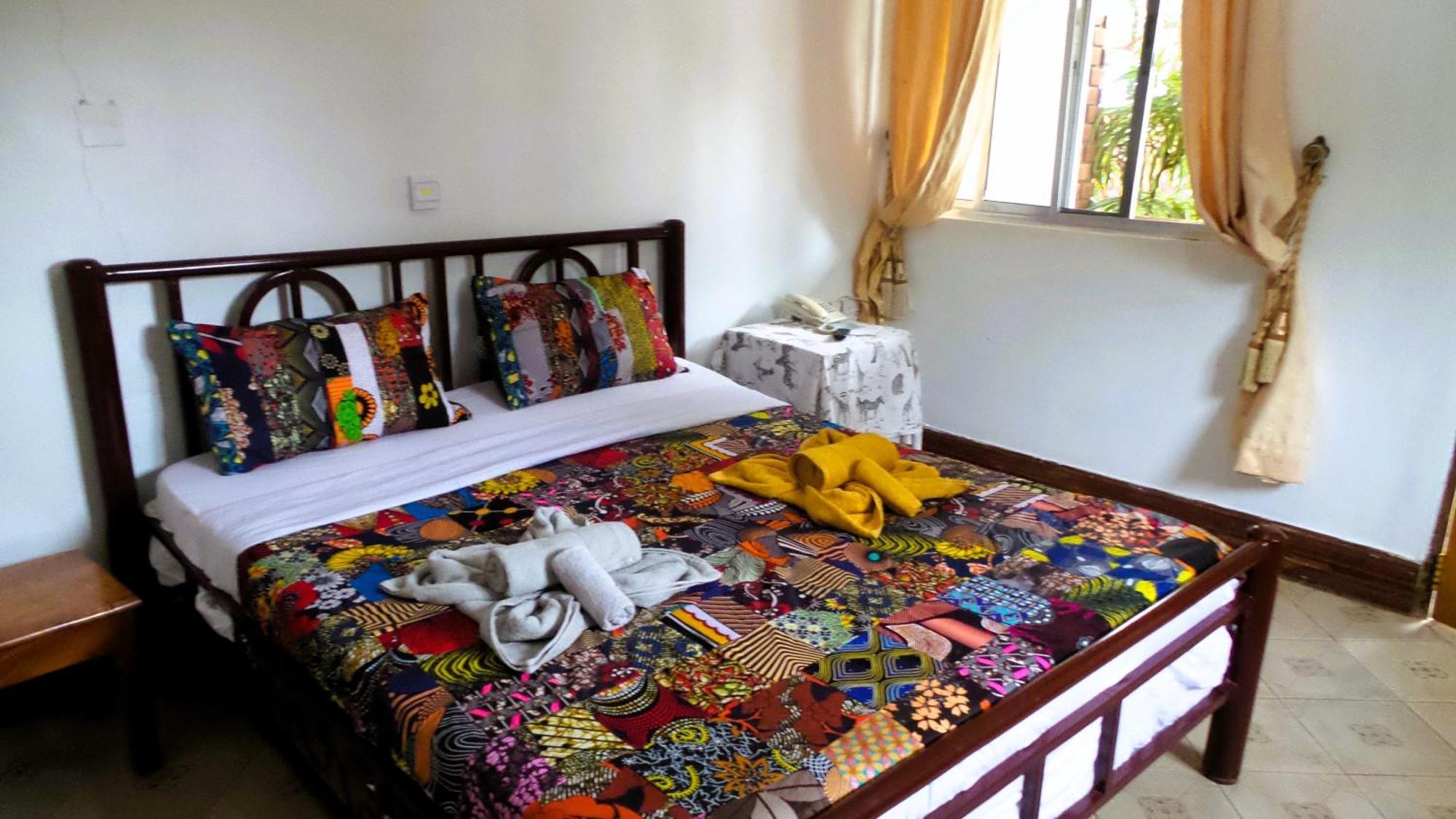 Home Feeling Neneu Lodge Moshi Buitenkant foto