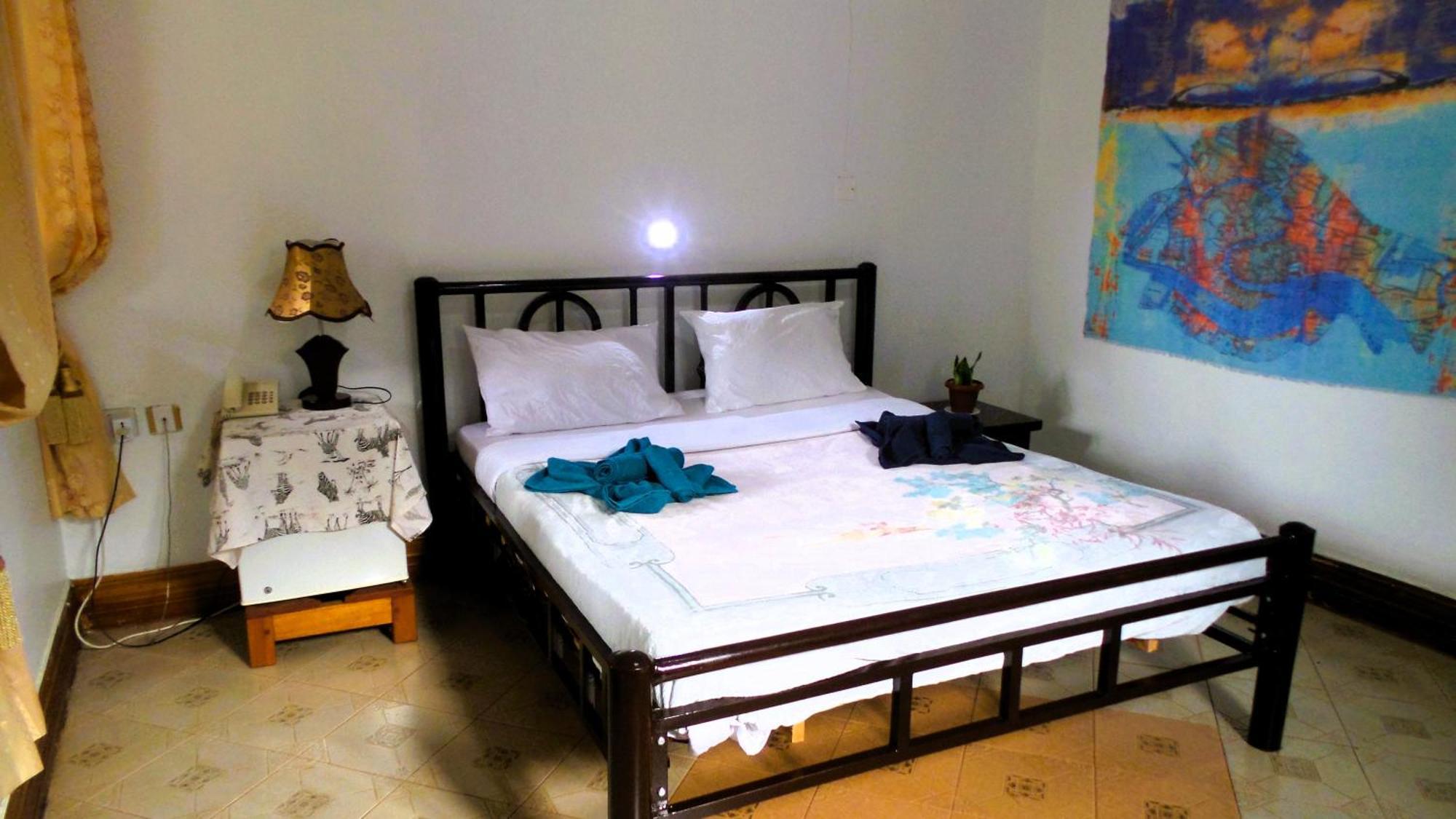 Home Feeling Neneu Lodge Moshi Buitenkant foto