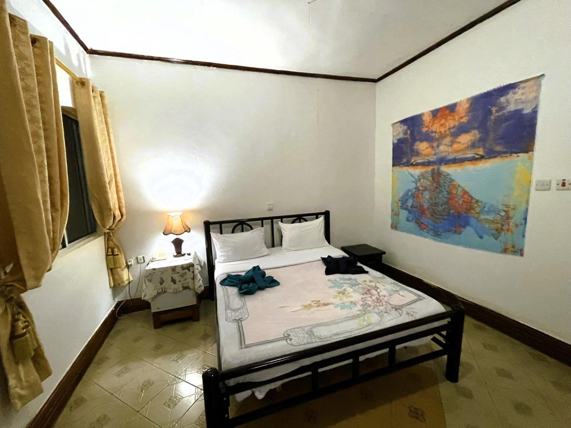Home Feeling Neneu Lodge Moshi Buitenkant foto