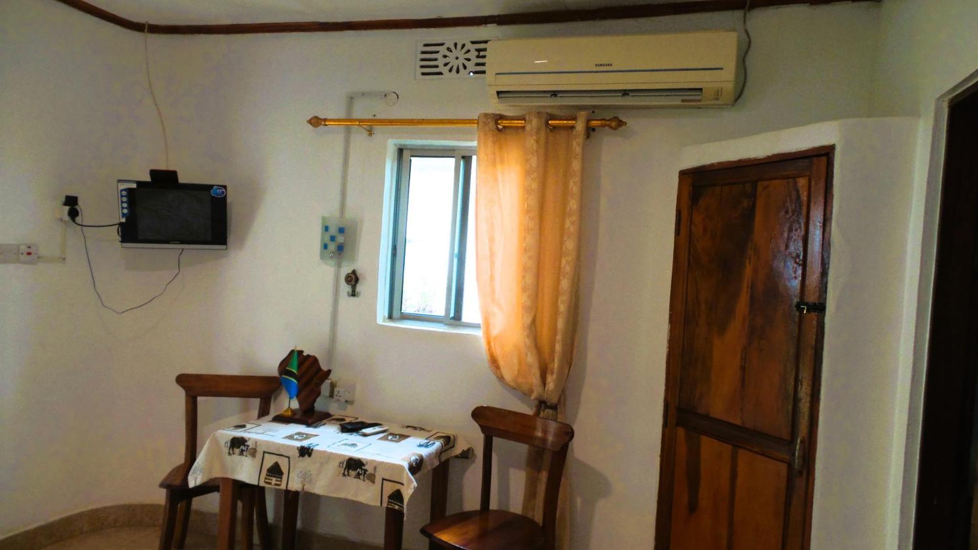 Home Feeling Neneu Lodge Moshi Buitenkant foto