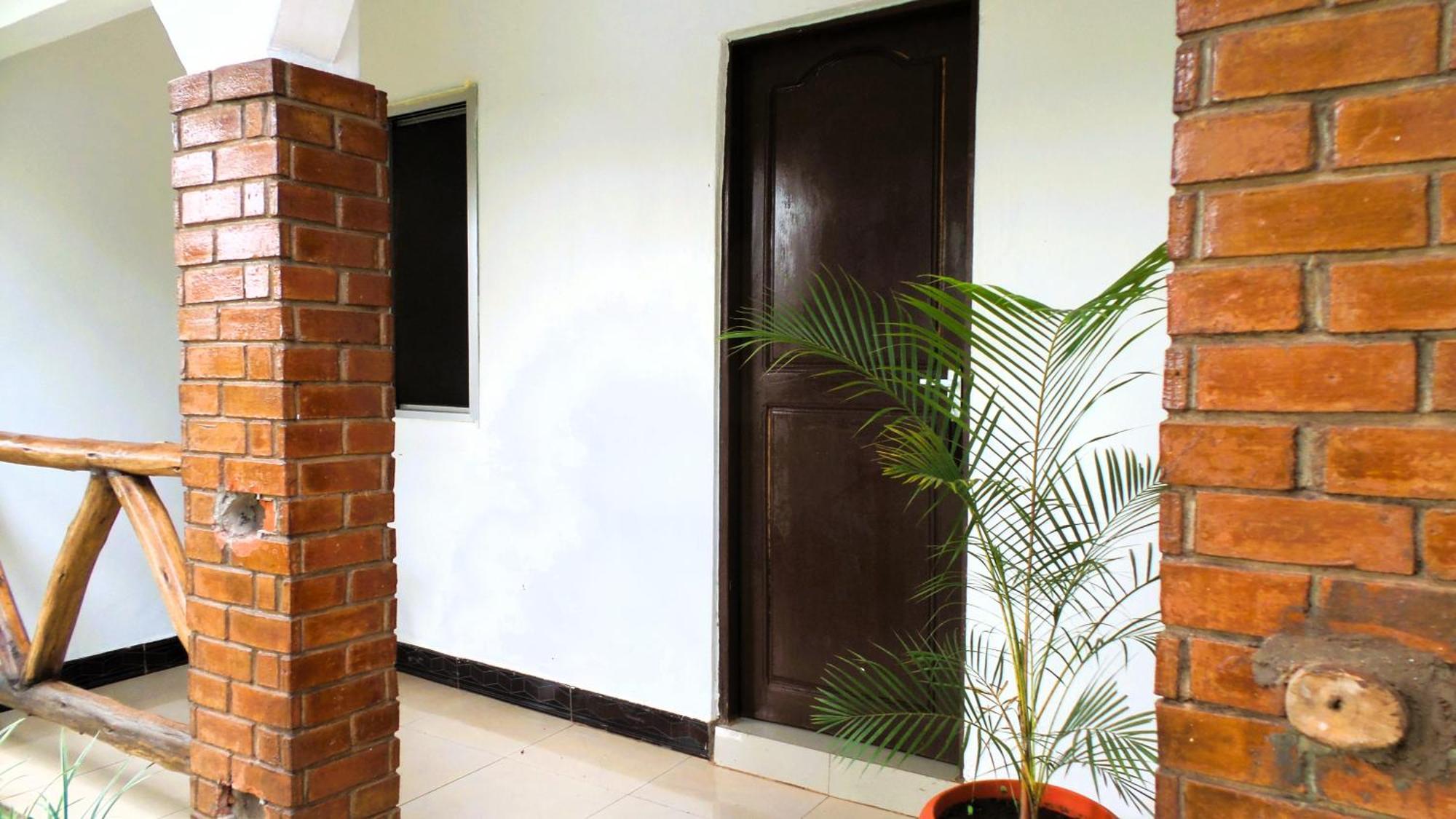 Home Feeling Neneu Lodge Moshi Buitenkant foto
