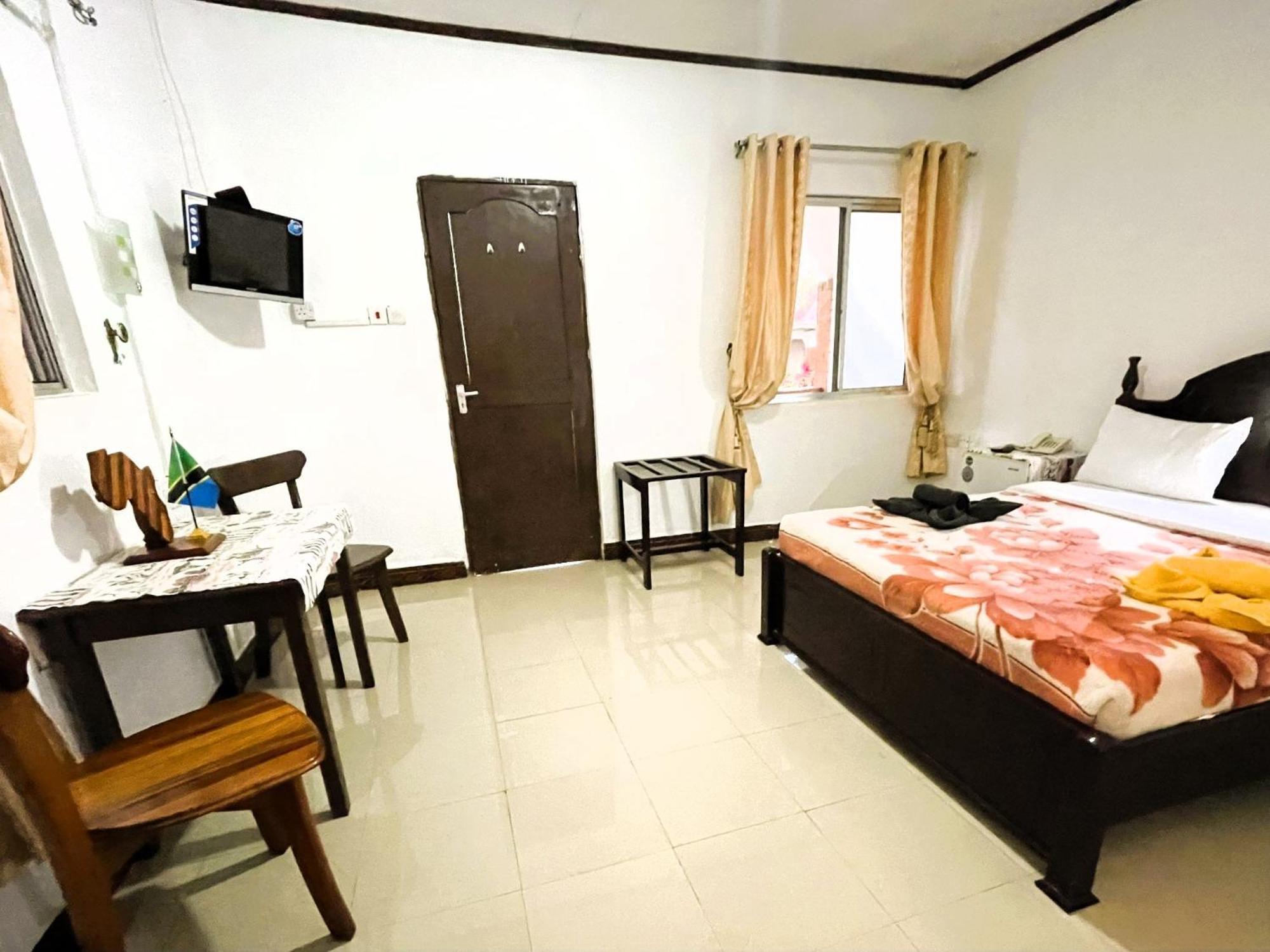 Home Feeling Neneu Lodge Moshi Buitenkant foto