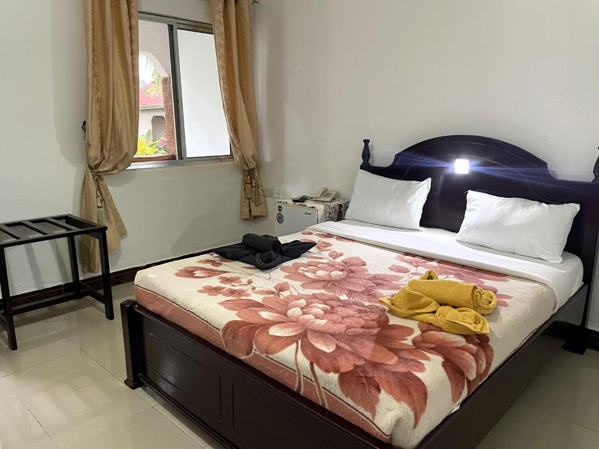 Home Feeling Neneu Lodge Moshi Buitenkant foto