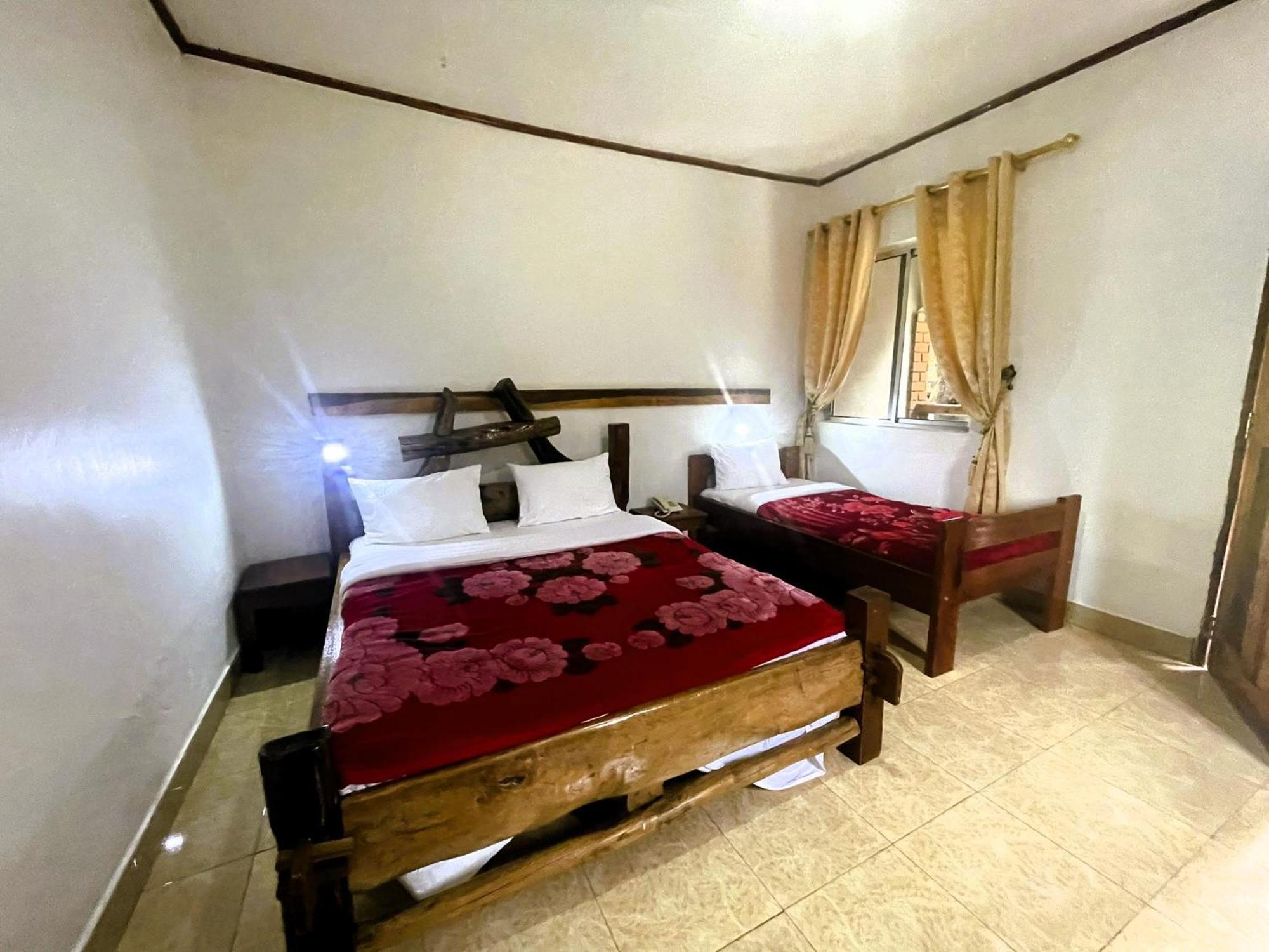 Home Feeling Neneu Lodge Moshi Buitenkant foto