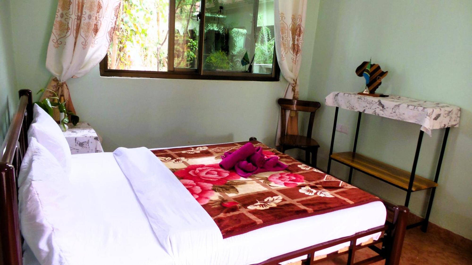 Home Feeling Neneu Lodge Moshi Buitenkant foto