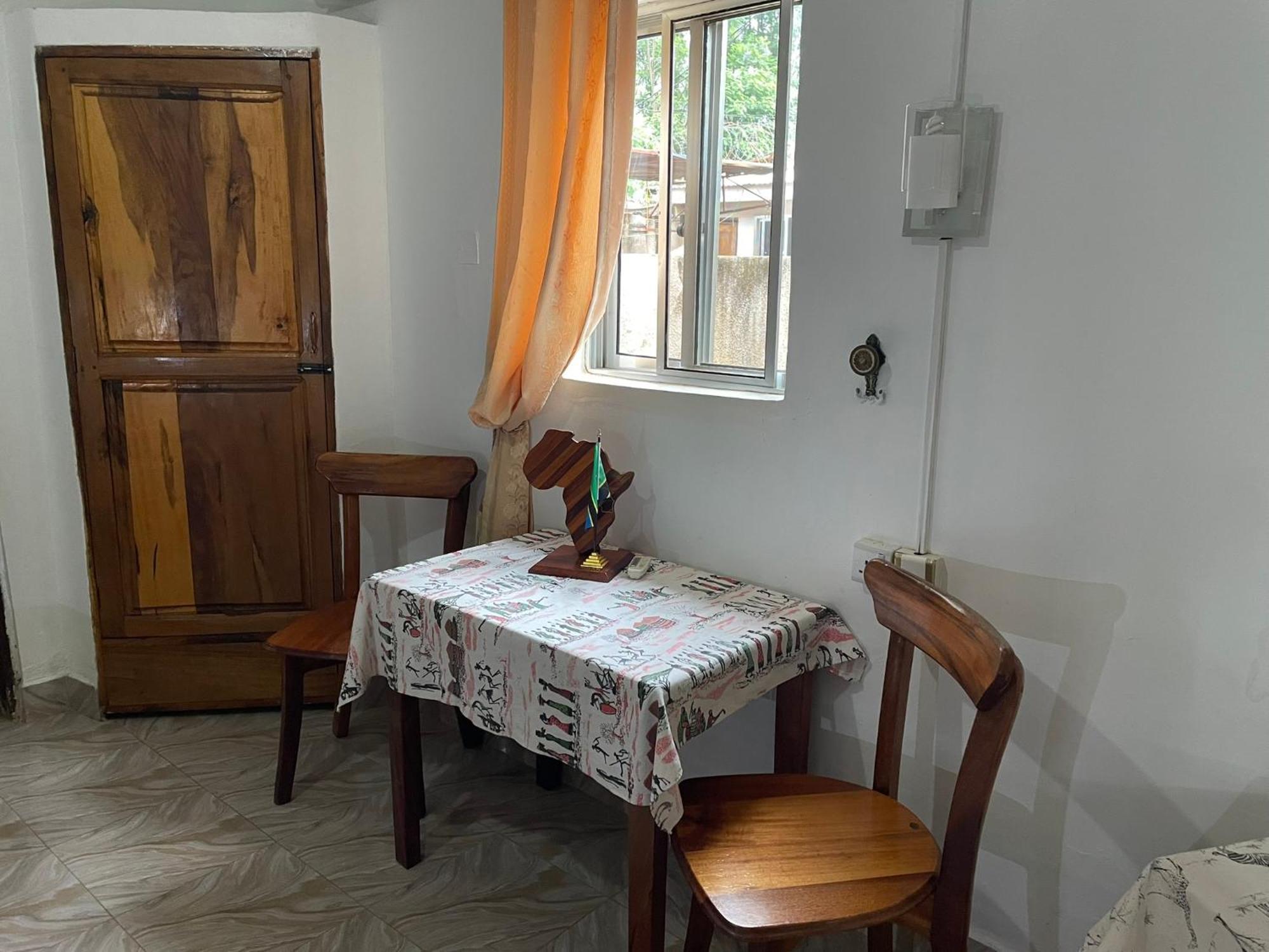 Home Feeling Neneu Lodge Moshi Buitenkant foto