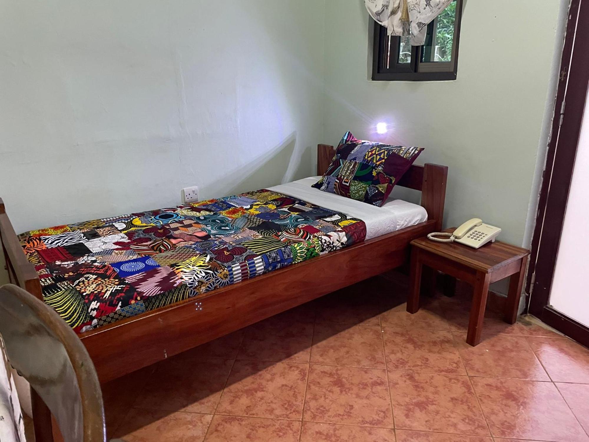 Home Feeling Neneu Lodge Moshi Buitenkant foto