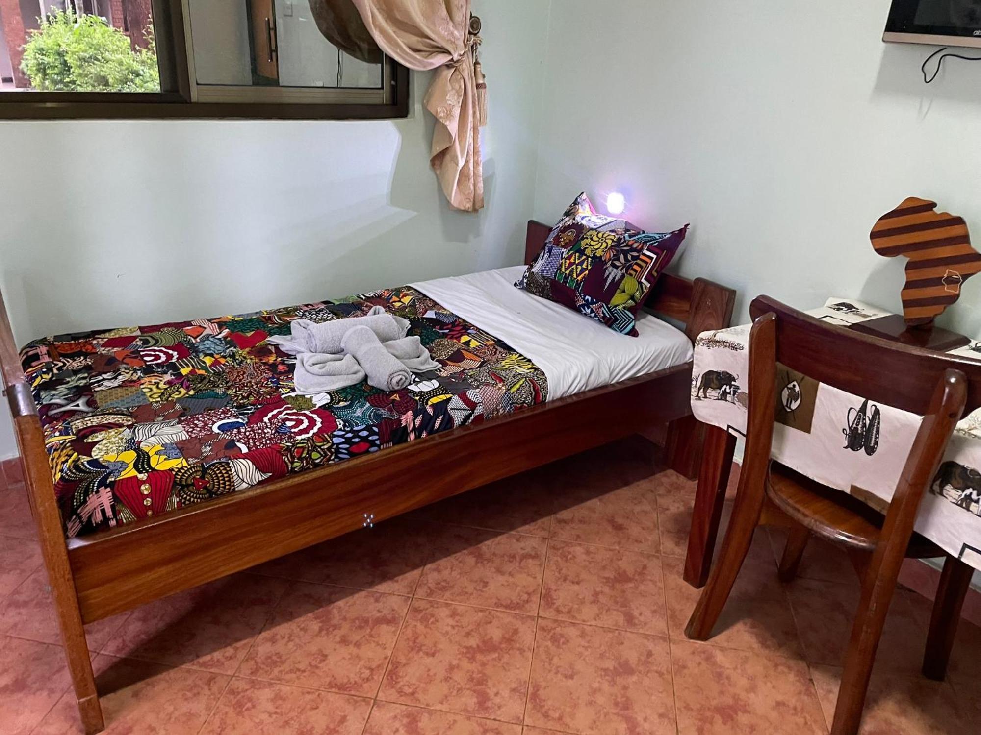 Home Feeling Neneu Lodge Moshi Buitenkant foto