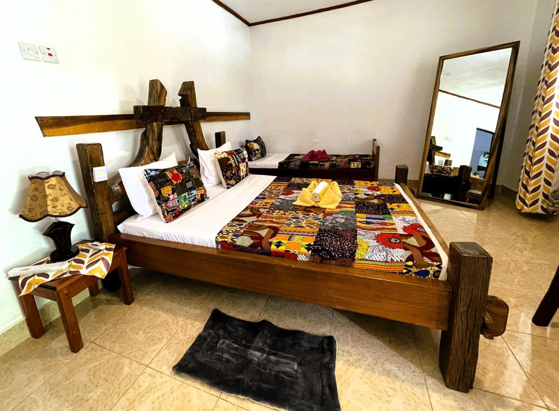 Home Feeling Neneu Lodge Moshi Buitenkant foto